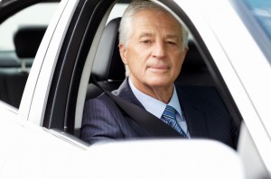 Mature Businessman in a Car